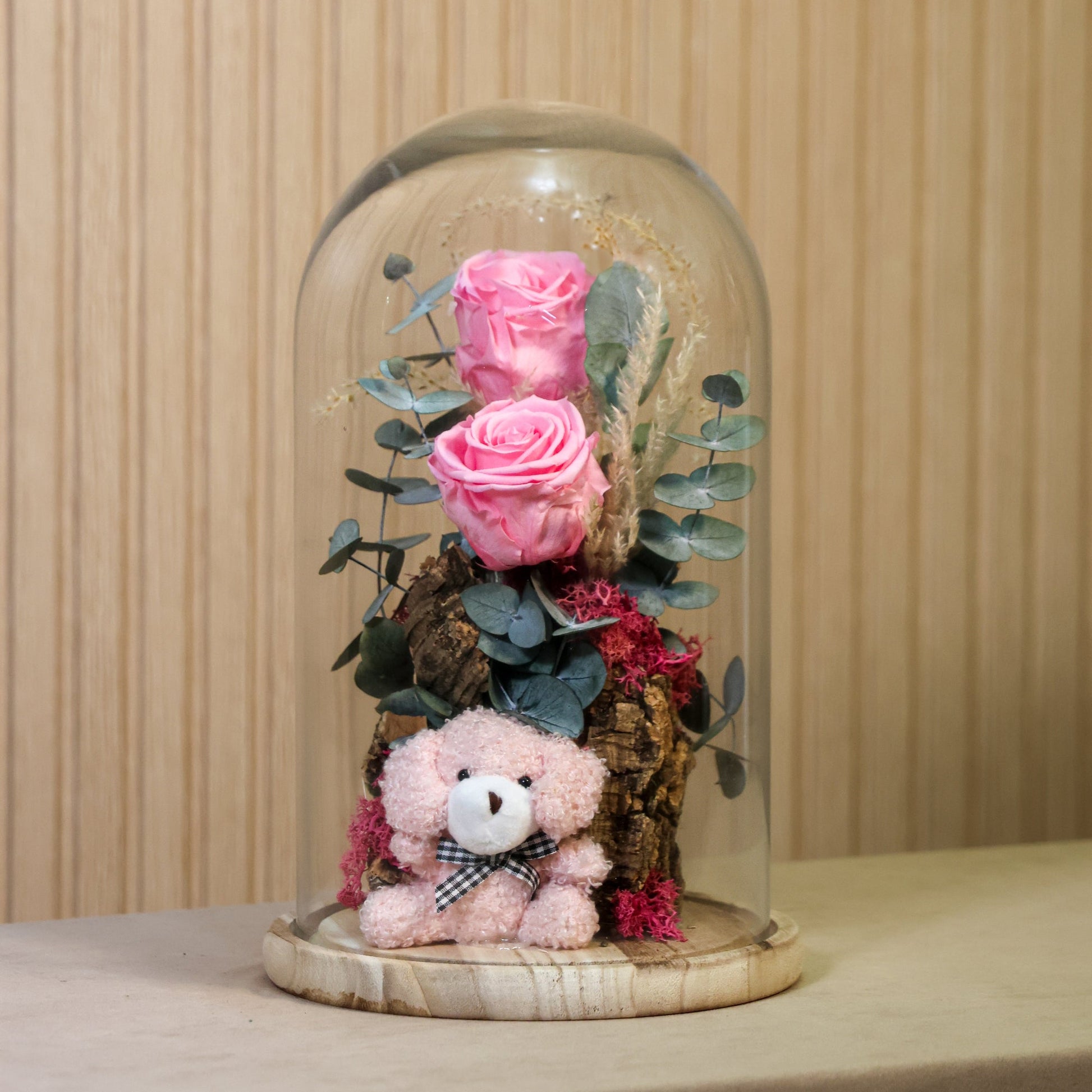 Cupula con rosas preservadas rosadas