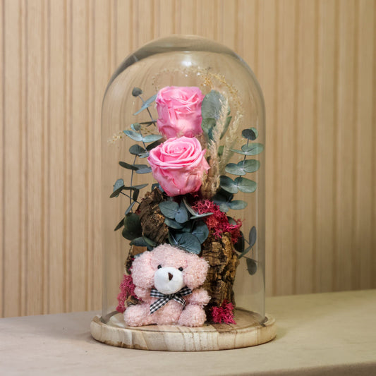 Cupula con rosas preservadas rosadas