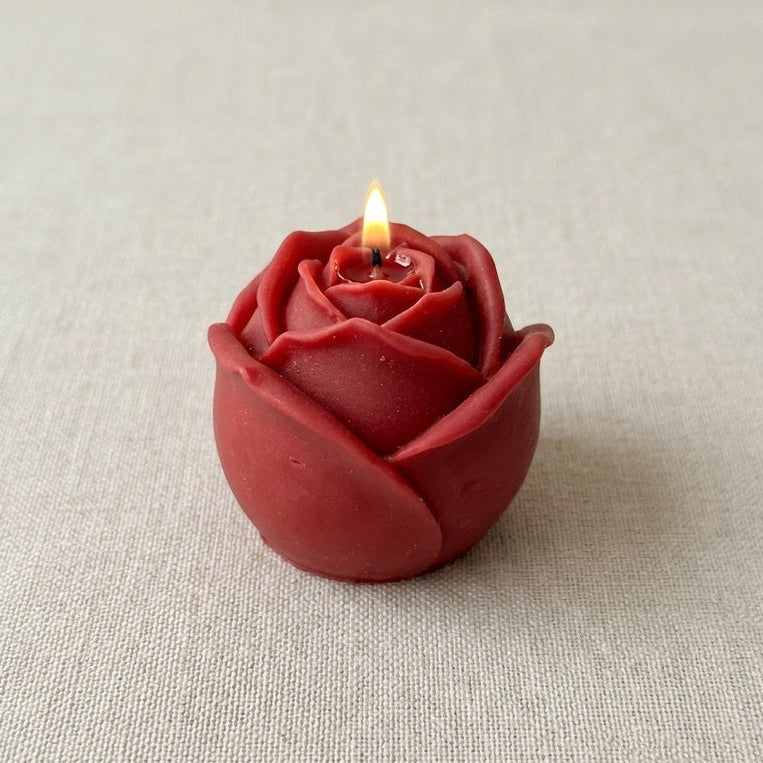 vela rosa encedida